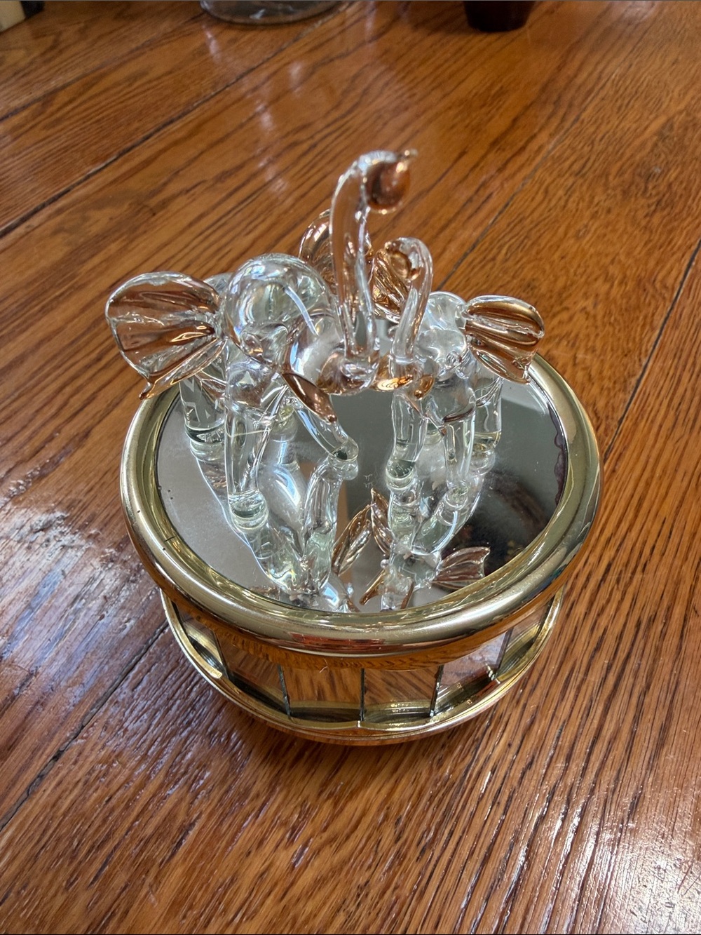 Toy Land vintage mirrored music box with elephants on top. Good condition. Works